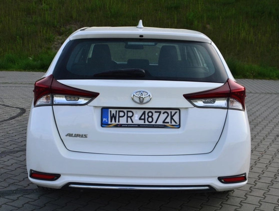 Toyota Auris cena 39900 przebieg: 125000, rok produkcji 2018 z Piastów małe 326